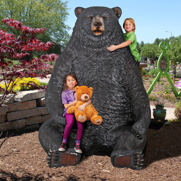 Sitting Pretty Oversized Black Bear Statue with Photo-Op Paw Seat